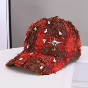 Distressed red plaid baseball cap with sparkling rhinestones and metallic star accent.