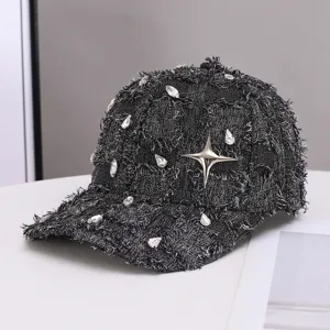 Black frayed denim baseball hat with sparkling rhinestones and a striking silver star design.