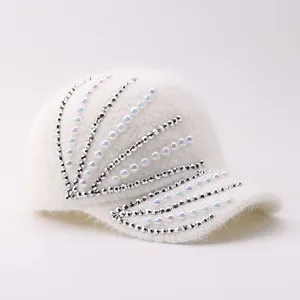 White winter warm knit baseball cap with shiny rhinestones and elegant pearls for women.