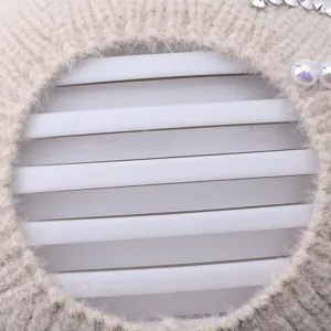 Winter warm knitted empty top hat with pearl rhinestone details, cozy plush fashion accessory.