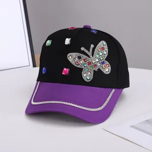 Gorra de béisbol con mariposa de diamantes de imitación negra y morada, elegante.