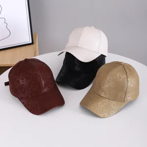 Set of embossed paisley pattern baseball caps in various colors, stylish curved brim design.