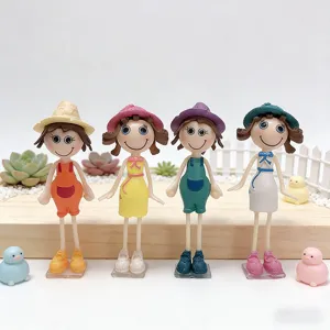 Four creative and cute 3D cartoon girl fridge magnets with colorful hats and dresses.
