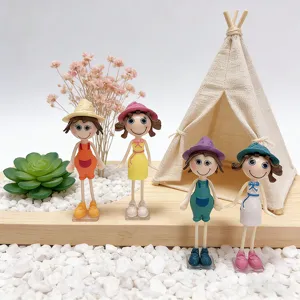 Detailed view of four creative 3D cartoon girl fridge magnets in a cozy decorative scene.