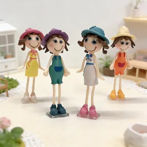 Set of four creative cute 3D cartoon girl fridge magnets in a miniature garden scene