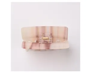 Detail view of the translucent jelly square hair claw clip featuring elegant pink gradient stripes