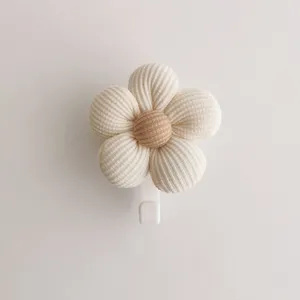 Detailed view of a cute Korean style cream-colored ribbed fabric flower adhesive wall hook