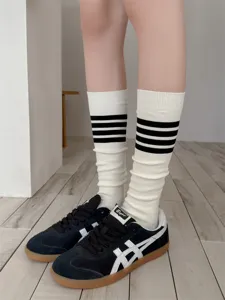 Japanese style retro knit calf socks with black stripes, soft and comfortable for daily wear.