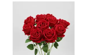Detailed close-up of red velvet artificial roses with realistic texture for home decoration