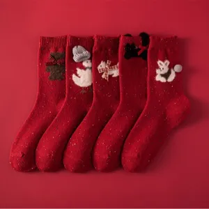 Red wool blend speckled mid-calf socks with cute animal embroidery and bows, festive winter wear.