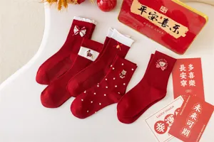 Red mid-tube socks for Year of Rabbit, cute bow bear embroidery, festive winter hosiery.