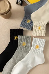 Men's casual mid-calf combed cotton socks featuring yellow lightning embroidery multi-pack.