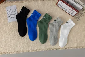 Men's combed cotton mid-calf sports crew socks with letter embroidery, multi colors available.