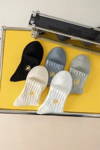 Men's mid-tube cotton socks with yellow lightning embroidery, 5-color casual sports socks.