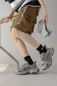 Men's cotton mid-tube socks featuring stylish embroidery, breathable and comfortable for daily streetwear.