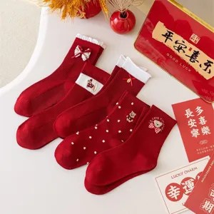 Red mid-calf socks for Chinese New Year featuring cute bear embroidery and bows, cotton.