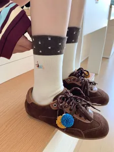 Cozy wool mid-calf socks with cute dachshund embroidery and coffee contrast cuff for women.
