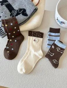 Cute winter mid-tube socks set featuring dachshund embroidery, polka dots, and cozy striped styles.