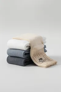 Detail shot of Japanese style thick knit crew socks for men, comfortable cotton style.