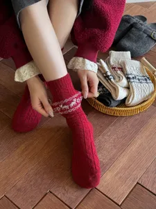 Red Christmas deer wool socks, vintage Nordic style warm slouch knit socks detail view.