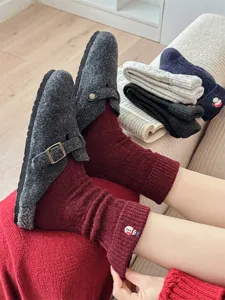 Winter wool Christmas socks with turned cuff and cute snowman embroidery for women warm.