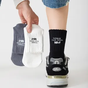 Cityboy style men's crew socks with stylish letter print, comfortable cotton daily wear.