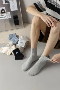 Men spring autumn letter embroidered mid tube socks, breathable trendy street cotton socks.