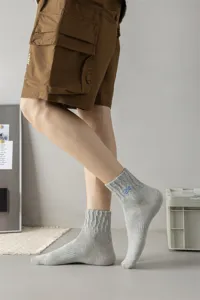 Men stylish letter embroidered grey mid-tube cotton socks for casual streetwear.