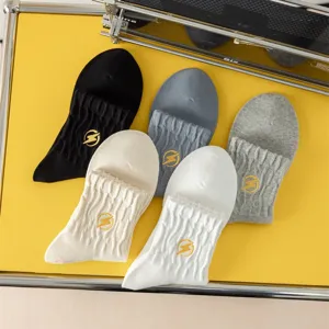 Men's mid-tube cotton socks with stylish yellow lightning embroidery, 5 colors pack.