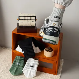 Men mid-calf casual socks with embroidered letters, comfortable combed cotton sports socks.