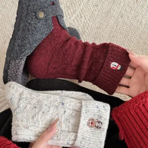 Winter thick wool crew socks for women with cute embroidery and cozy speckled knit design.