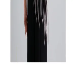 Silk blend scarf fringe detail close-up showing texture and elegant flow for women's autumn style.