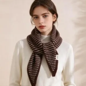 Detailed view of women's autumn winter knitted striped triangle scarf cozy wool neck warmer.