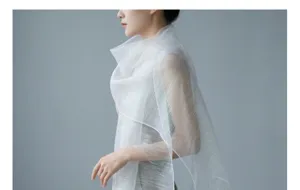 Elegant white silk blend translucent long scarf shawl featuring shimmering lines for women.