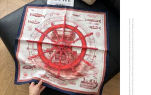 Classic 70cm silk feel square scarf with nautical ship wheel design for women daily wear.