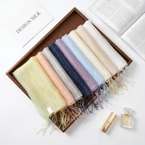Elegant 100% mulberry silk scarf set featuring multiple vibrant colors and delicate fringe.