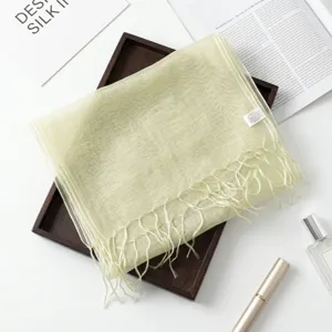 Light green mulberry silk scarf with delicate tassels, elegant long shawl for women.
