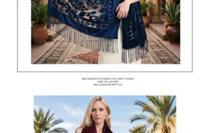 Detail view of the elegant velvet fringed shawl with embossed patterns in rich blue and wine.