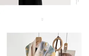 Detailansicht des luxuriösen Maulbeerseide Jacquard Schals mit eleganter Kulturmusterung.