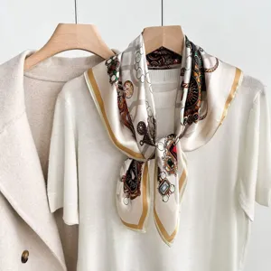 Detailed view of luxury silk square scarf with vintage baroque chain print and elegant design.