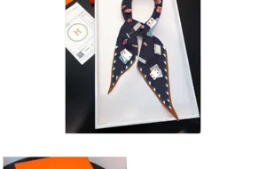 Luxury twill silk diamond scarf with elegant poker and rose floral pattern for women.