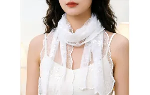 White floral lace scarf detail, delicate embroidery and scalloped edges for elegant style.