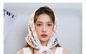 Detail view of a white lace triangle headscarf worn by a model, elegant Korean style hair accessory.