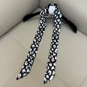 Chic black and white polka dot skinny silk scarf, versatile twilly neckerchief for women.