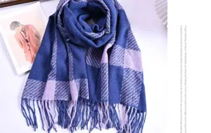 Detail view of the autumn winter plaid cashmere feel couple scarf with classic tassels.