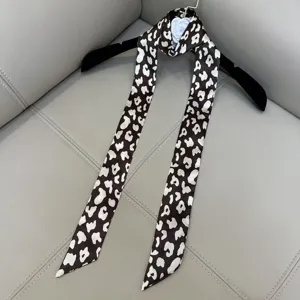 Chic narrow long silk scarf with abstract dot pattern, stylish neckerchief for all seasons.