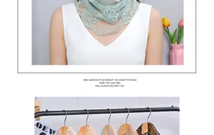 Detailed view of mint green lace embroidered triangular scarf and decorative shawl.