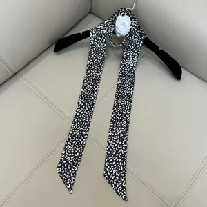 Black and white leopard print skinny scarf, chic narrow twilly for women, versatile necktie.