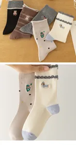 Cute cartoon animal embroidered mid-calf socks for women, sweet ruffles and cozy cotton fabric.