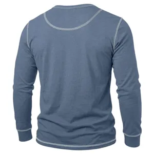 Close-up detail of the back view of a blue long sleeve shirt with contrast white stitching.